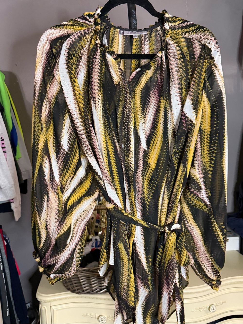 Jennifer Lopez pleated abstract chevron print blouse